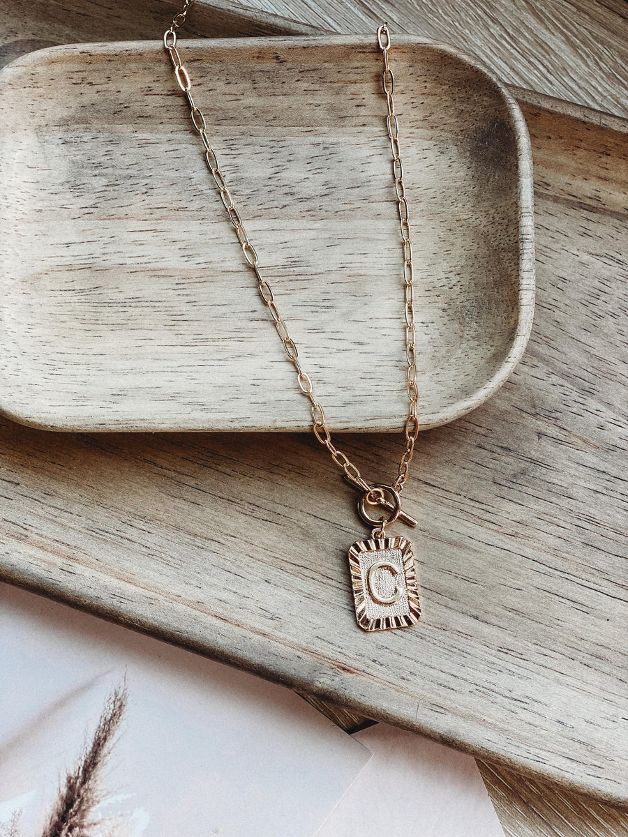 Gold Tone Initial Tag Pendant Necklace