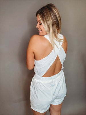 The On The Go White Cross Back Romper - The Rack Boutique ⚡️